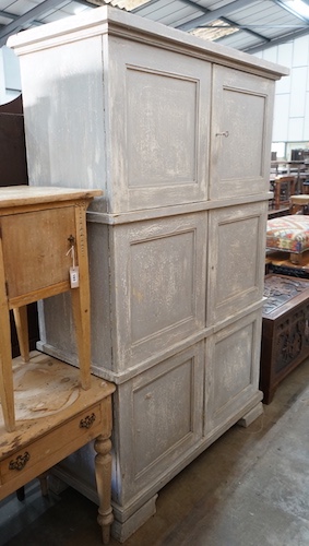 A painted pine and hardwood six door cabinet, width 124cm, depth 52cm, height 200cm